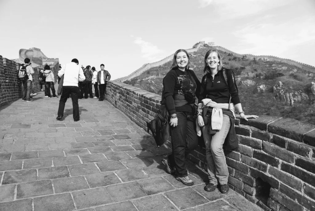 the great wall in China two friends traveling together