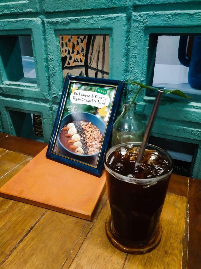 Iced Americano with metal straw