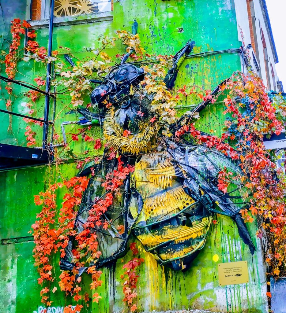 An outdoor art piece that looks like a bee in Lisbon's LX Factory