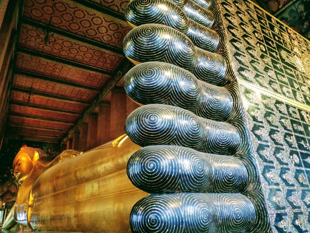 Enormous gold reclining buddha in Bangkok