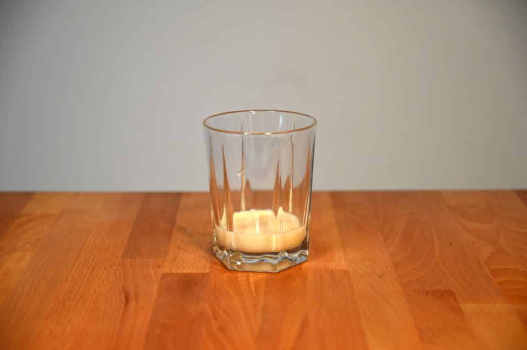 glass with sweetened condensed milk