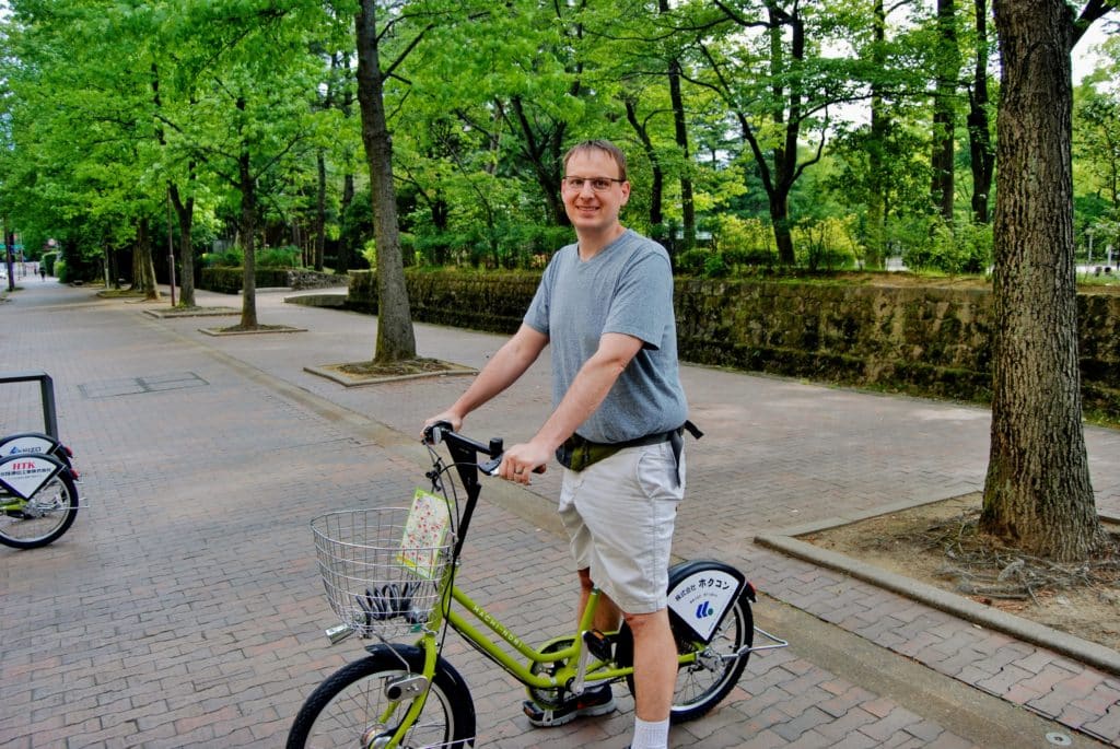 man on bicycle in Kanazawa Japan