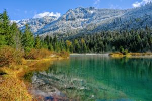 Gold Creek Pond with fall colors and snowy mountain