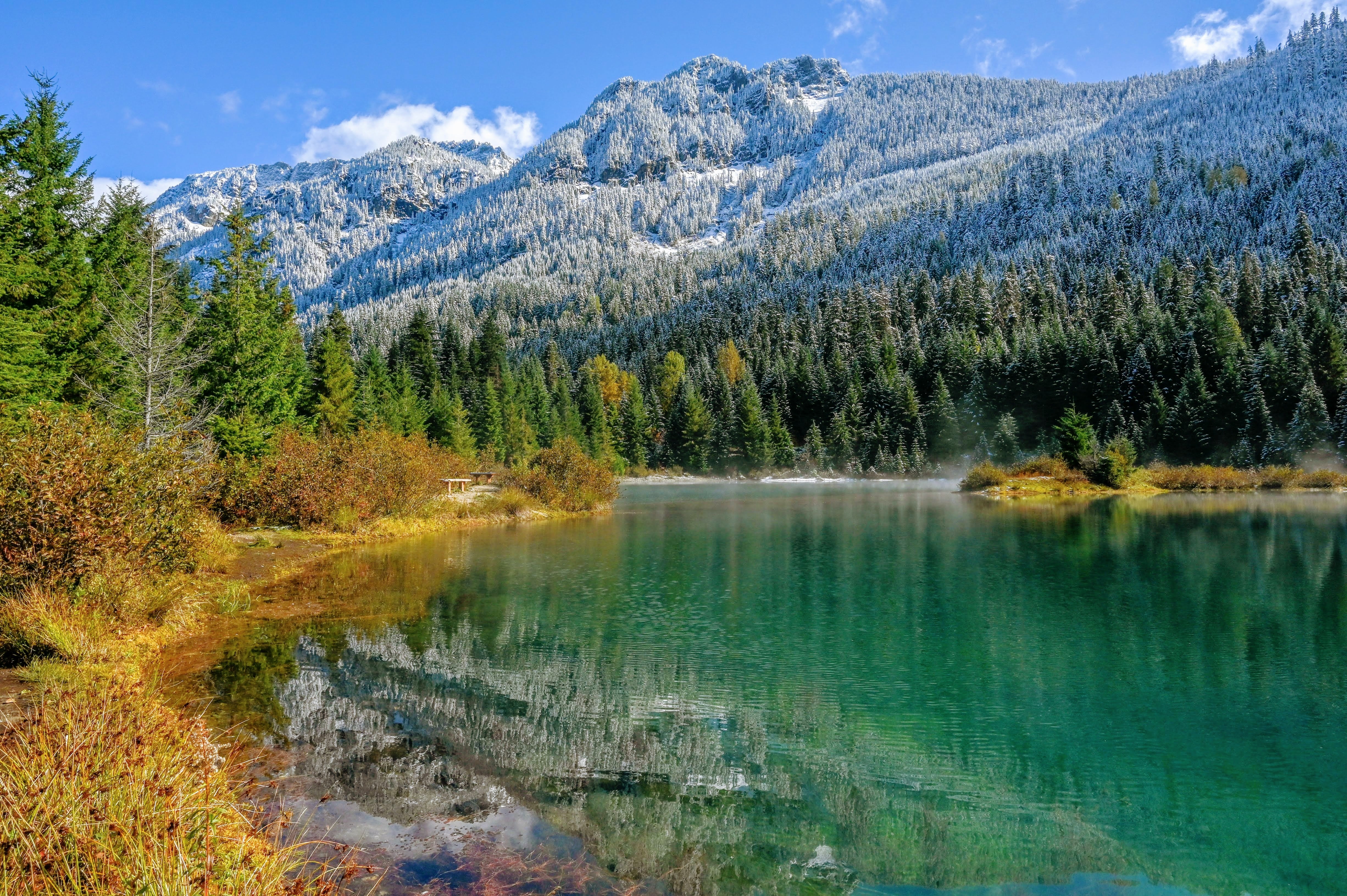 Gold Creek Pond with fall colors and snowy mountain