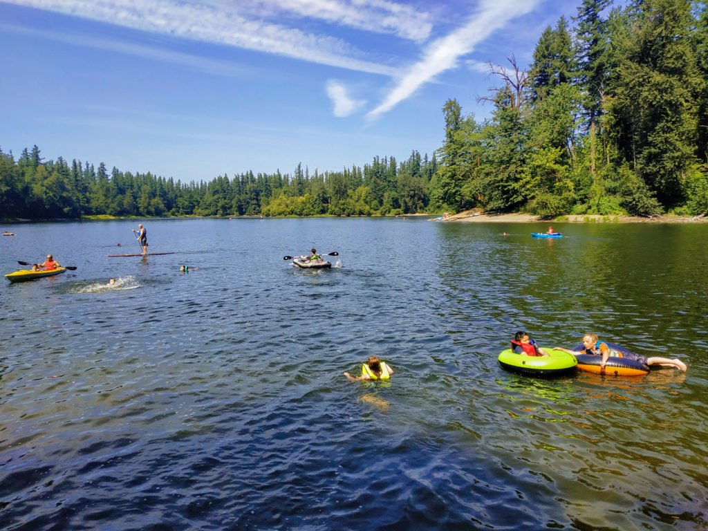 people swimming in Deep Lake