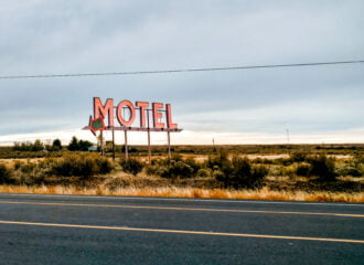 Motel sign on the side of the road