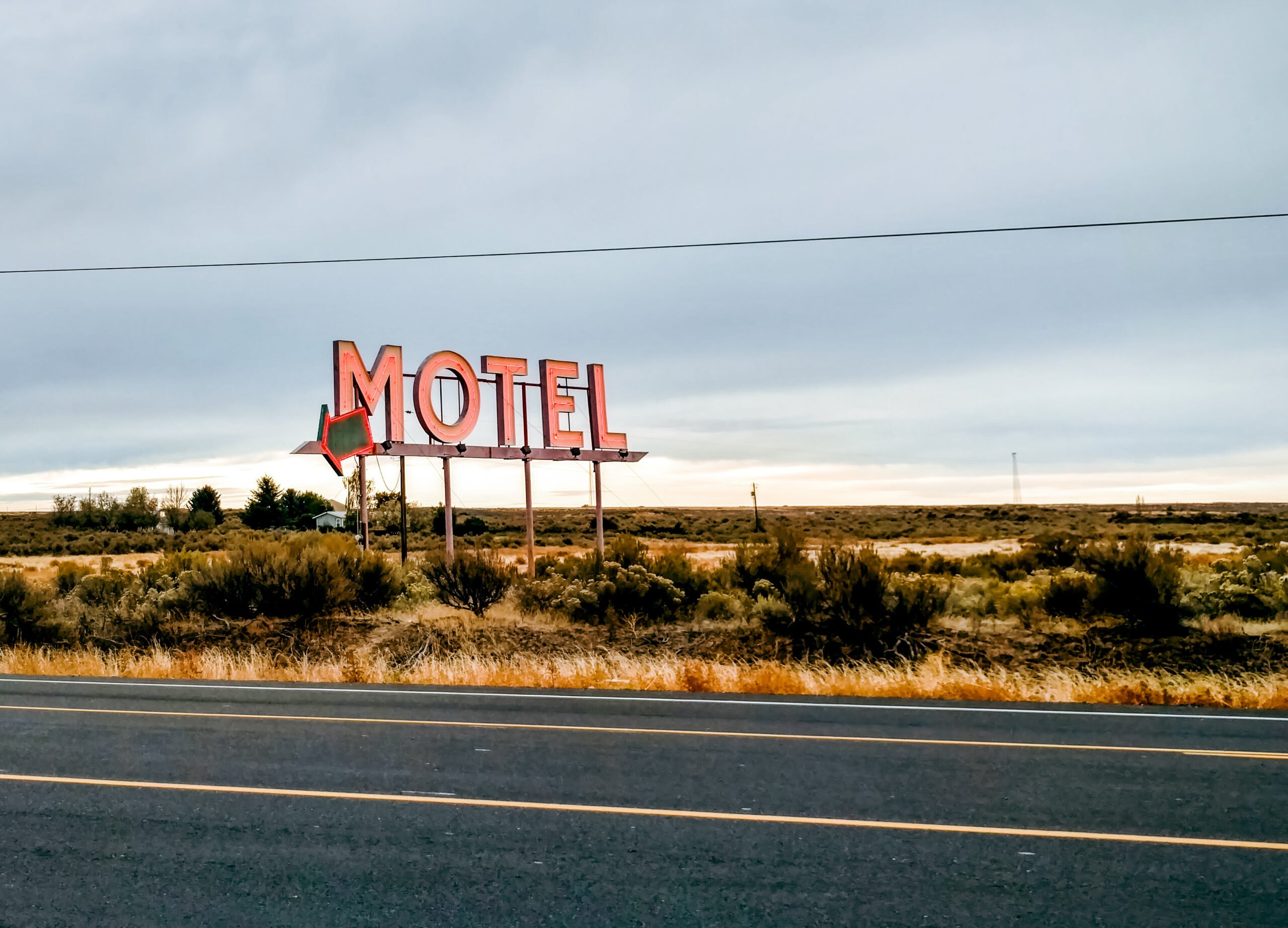 Motel sign on the side of the road