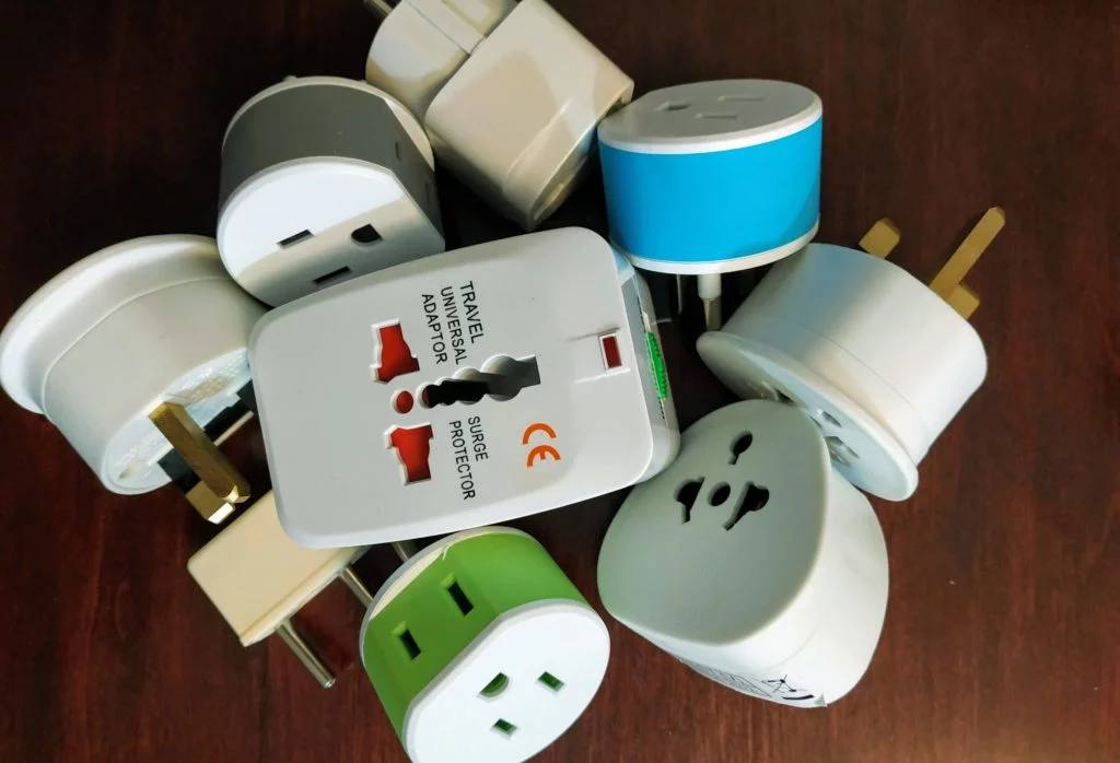 pile of travel adapters