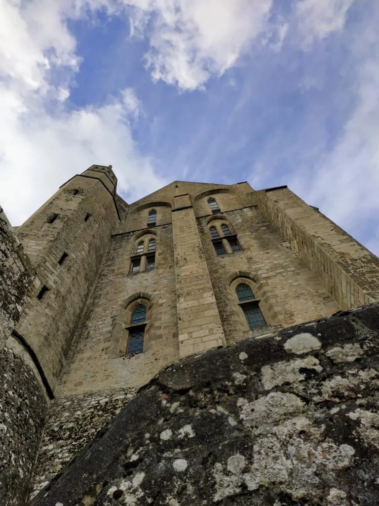 looking up at the abbey towering above