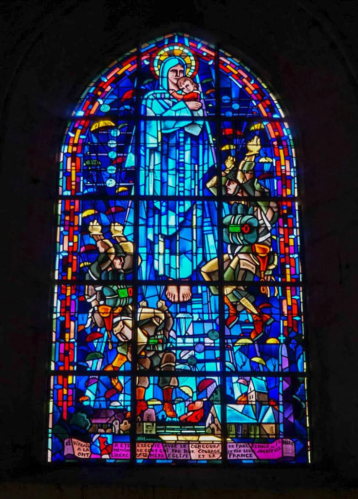 stained glass window of angel and paratroopers