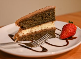 Coffee Cake with strawberry on the side