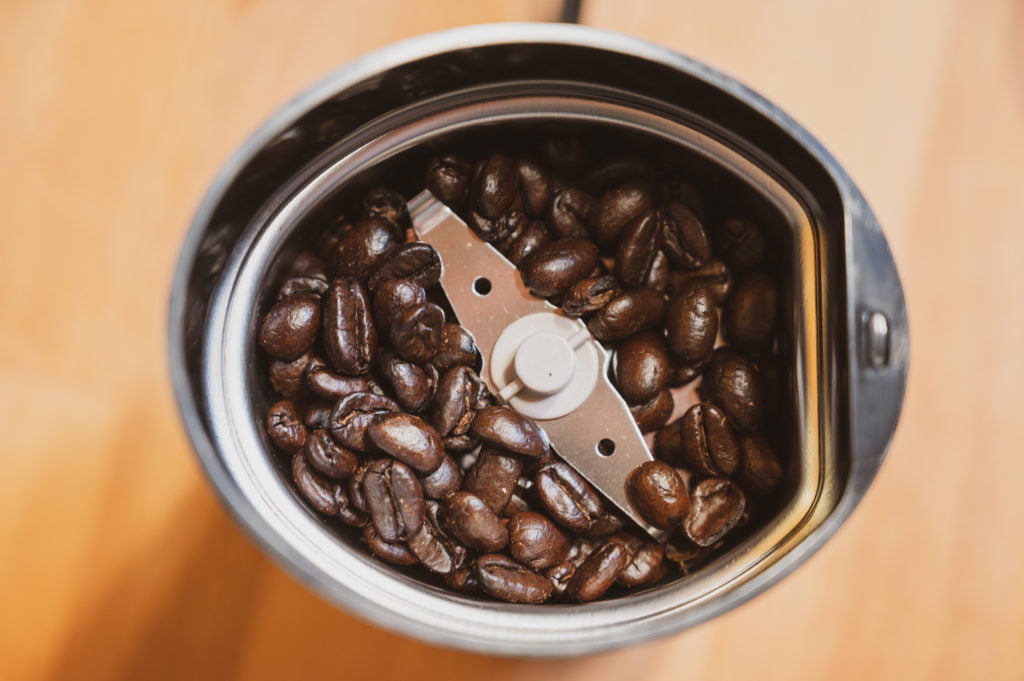 coffee beans in grinder