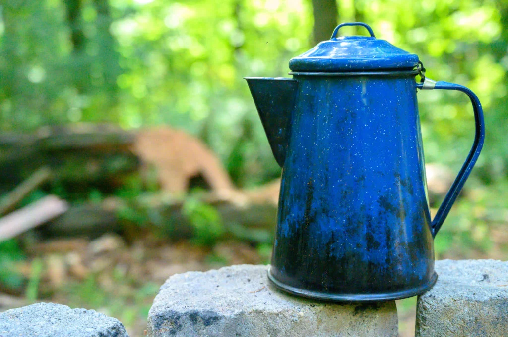 Process of making camping coffee outdoor Stock Photo by bondarillia