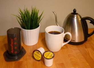 coffee with aeropress, k-cups and hot water kettle