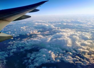 view from airplane over the clouds