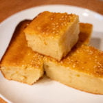 coconut custard mochi with sesame seeds