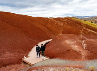 couple with dog at painted cove