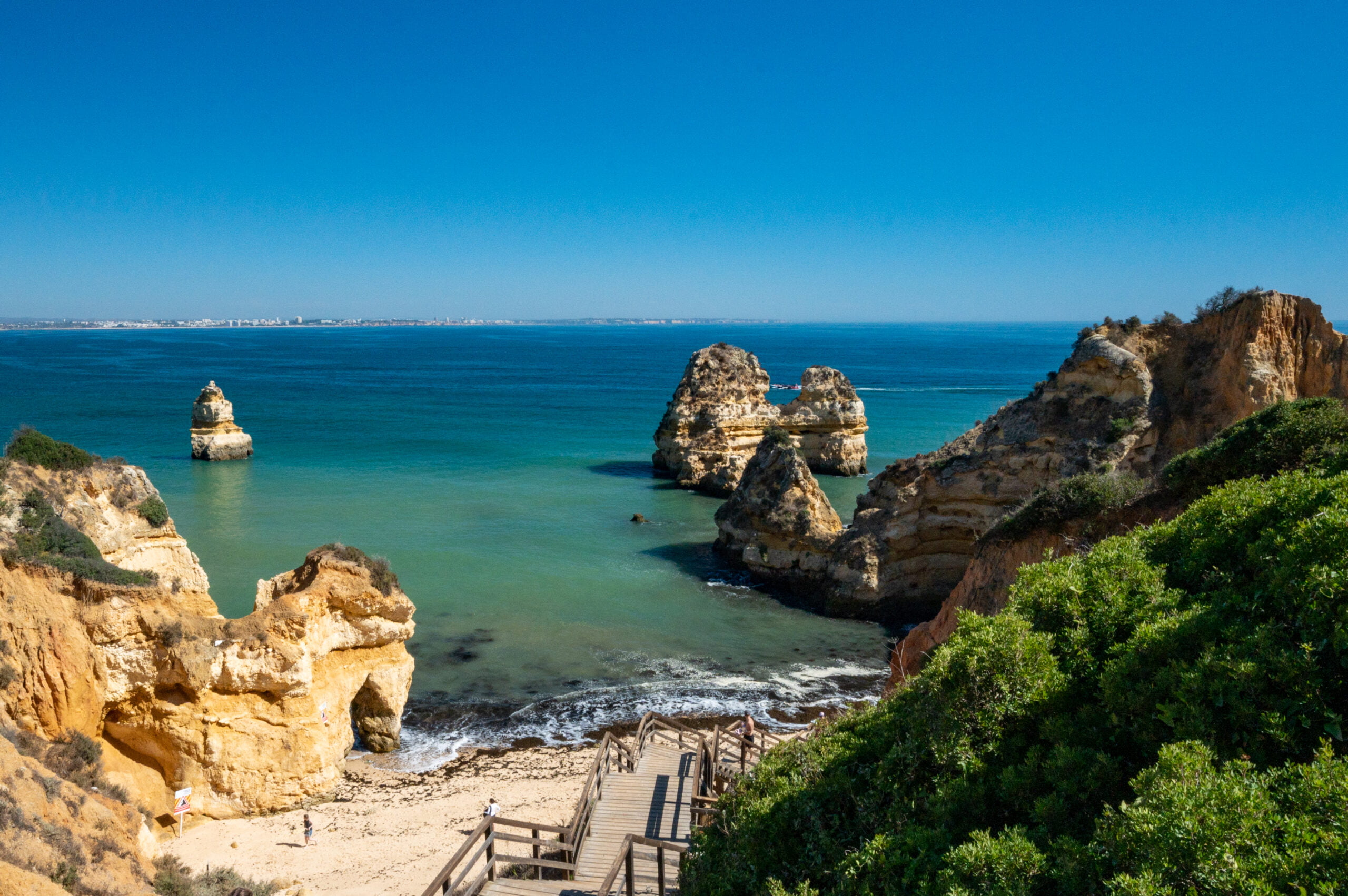 stairs leading to Praia do Camilo