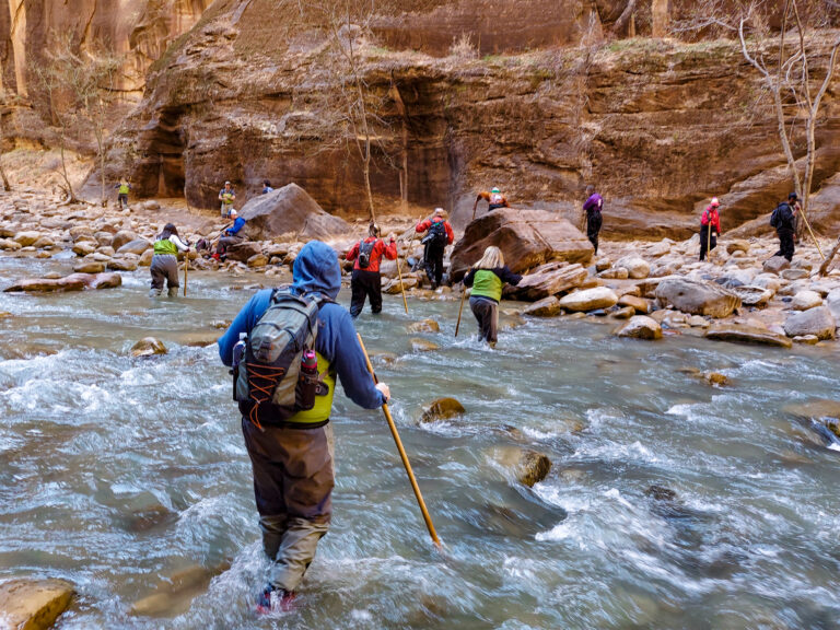 crossing small rapids hiking in The Narrows