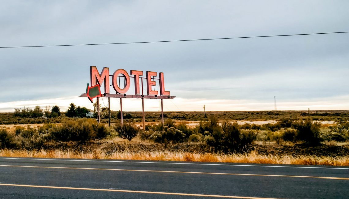 Motel sign on the side of the road