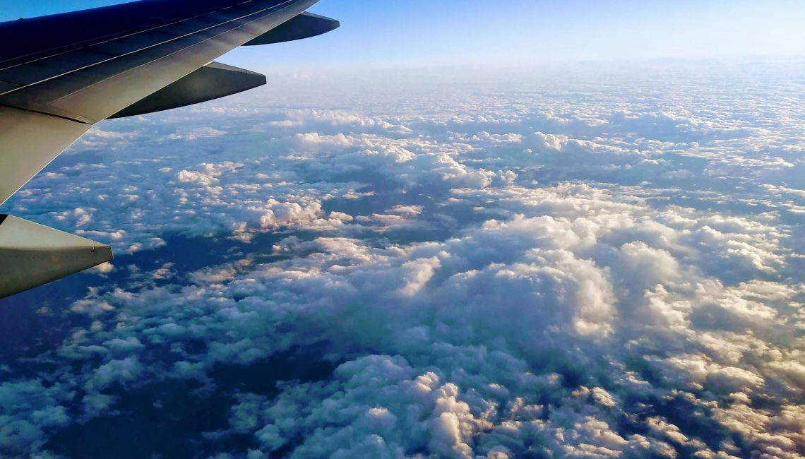 view from airplane over the clouds