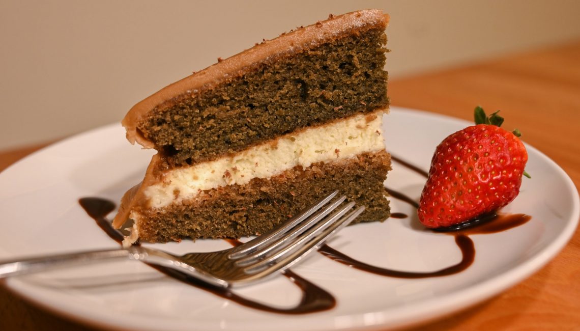 Coffee Cake with strawberry on the side